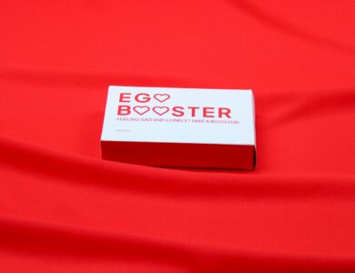 A red cloth with a business card on it