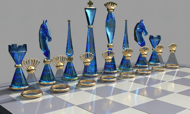 a chess board with blue glass pieces on it