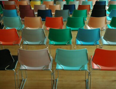 assorted-color plastic chair lot inside room