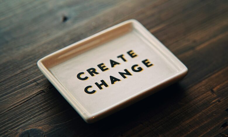 A white tray with the words create change written on it