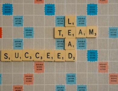 scrabbled scrabble tiles with words on them