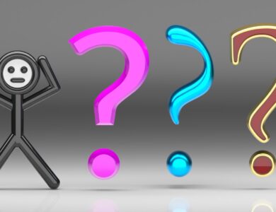 A person standing in front of a group of question marks